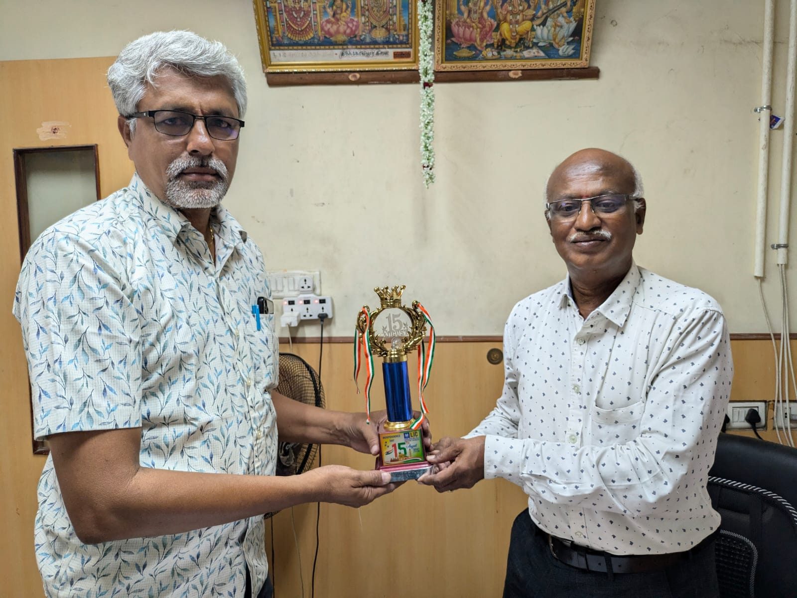 G. Selvakumar receiving an Independence Day trophy